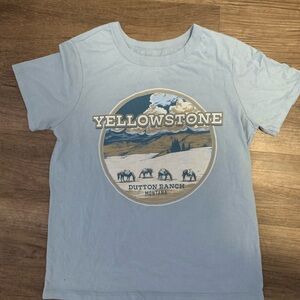 Cute light blue yellow stone shirt.